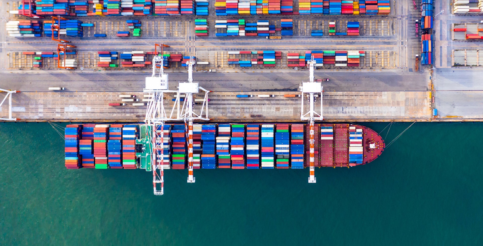 A large dock filled with lots of cargo.